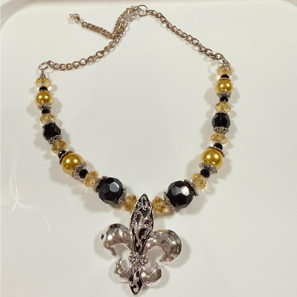 N5 - Elegant Black and Gold Fleur-de-Lis Necklace